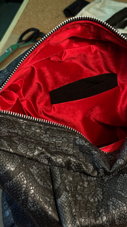 BLACK REPTILE DUFFLE BAG